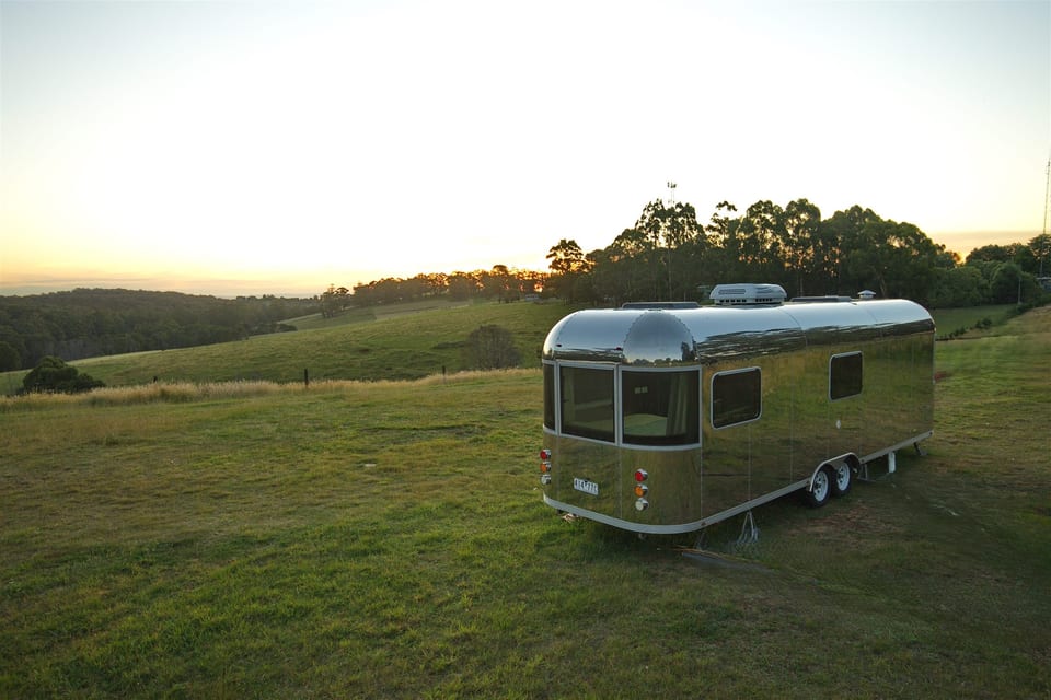 Caravan exterior with open countryside behind it