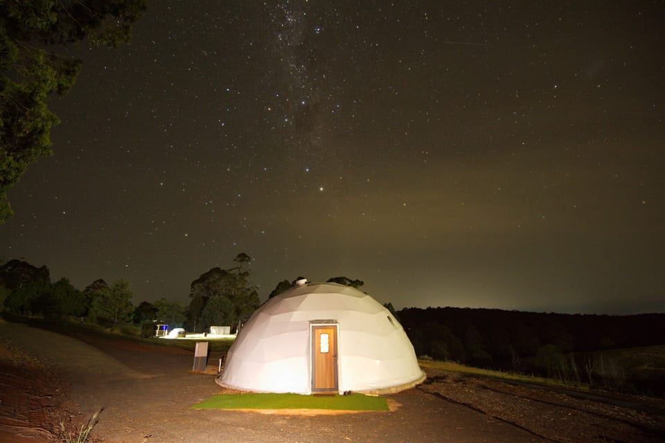 The dome photographed beneath a star-filled night sky