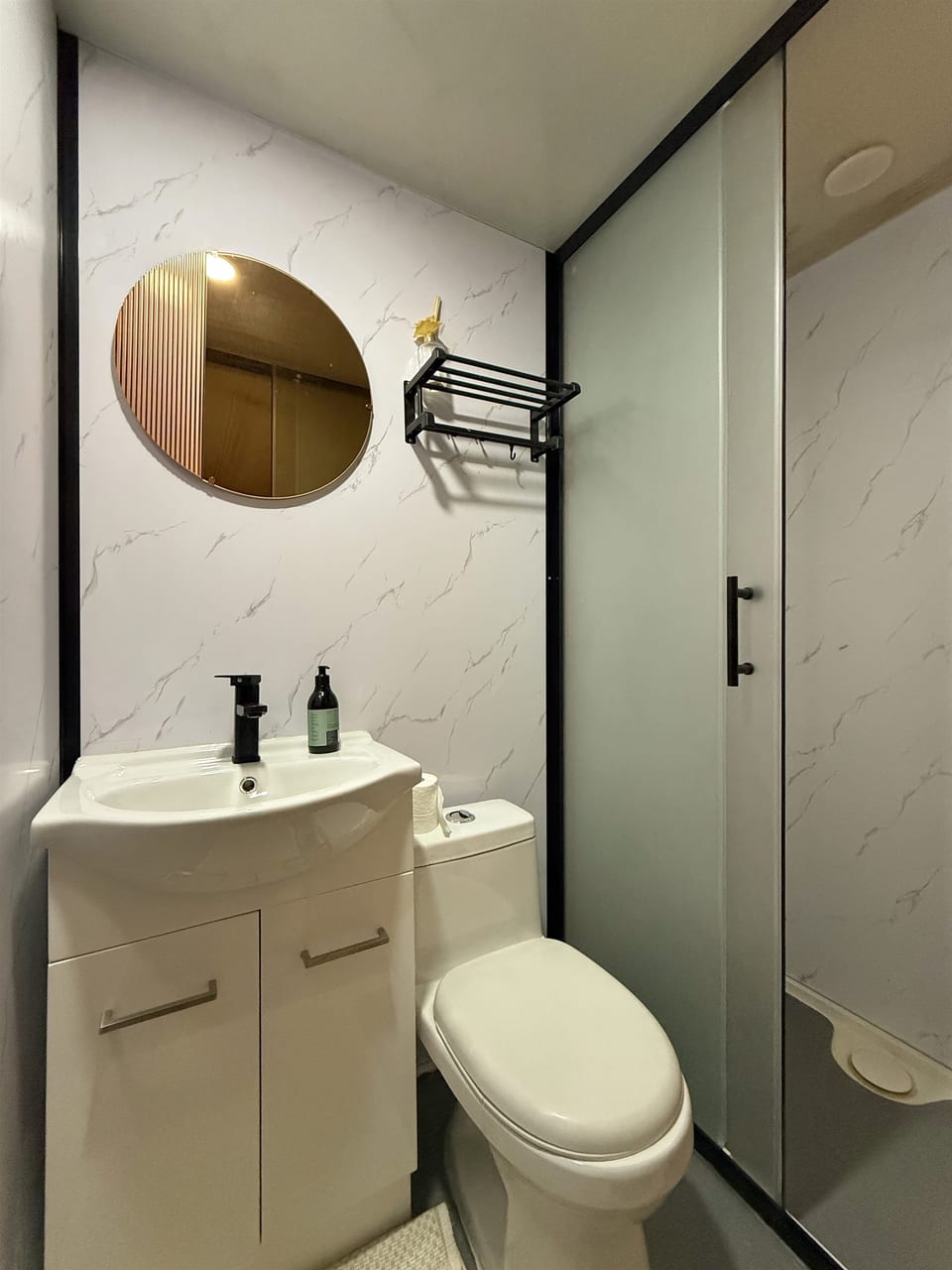 Vanity, toilet and shower in the dome's private ensuite